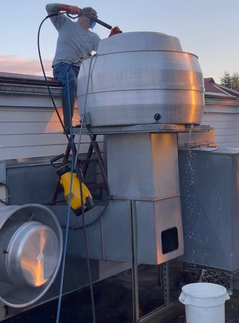 A large industrial ventilation or exhaust system on a rooftop.